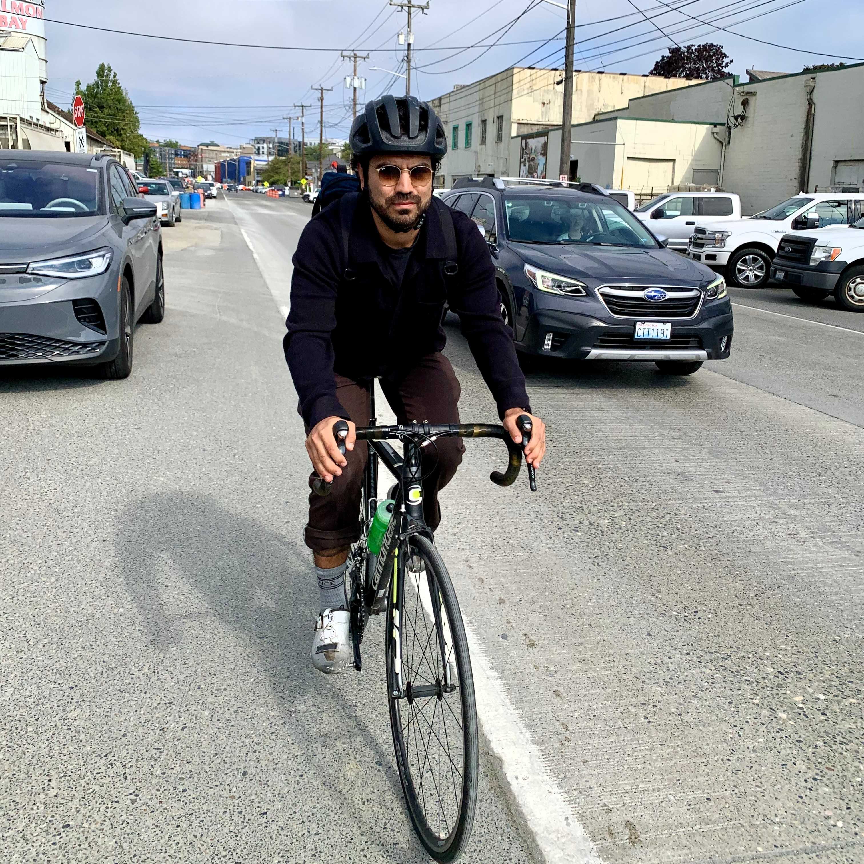 Tyler biking on Shilshole Ave NW
