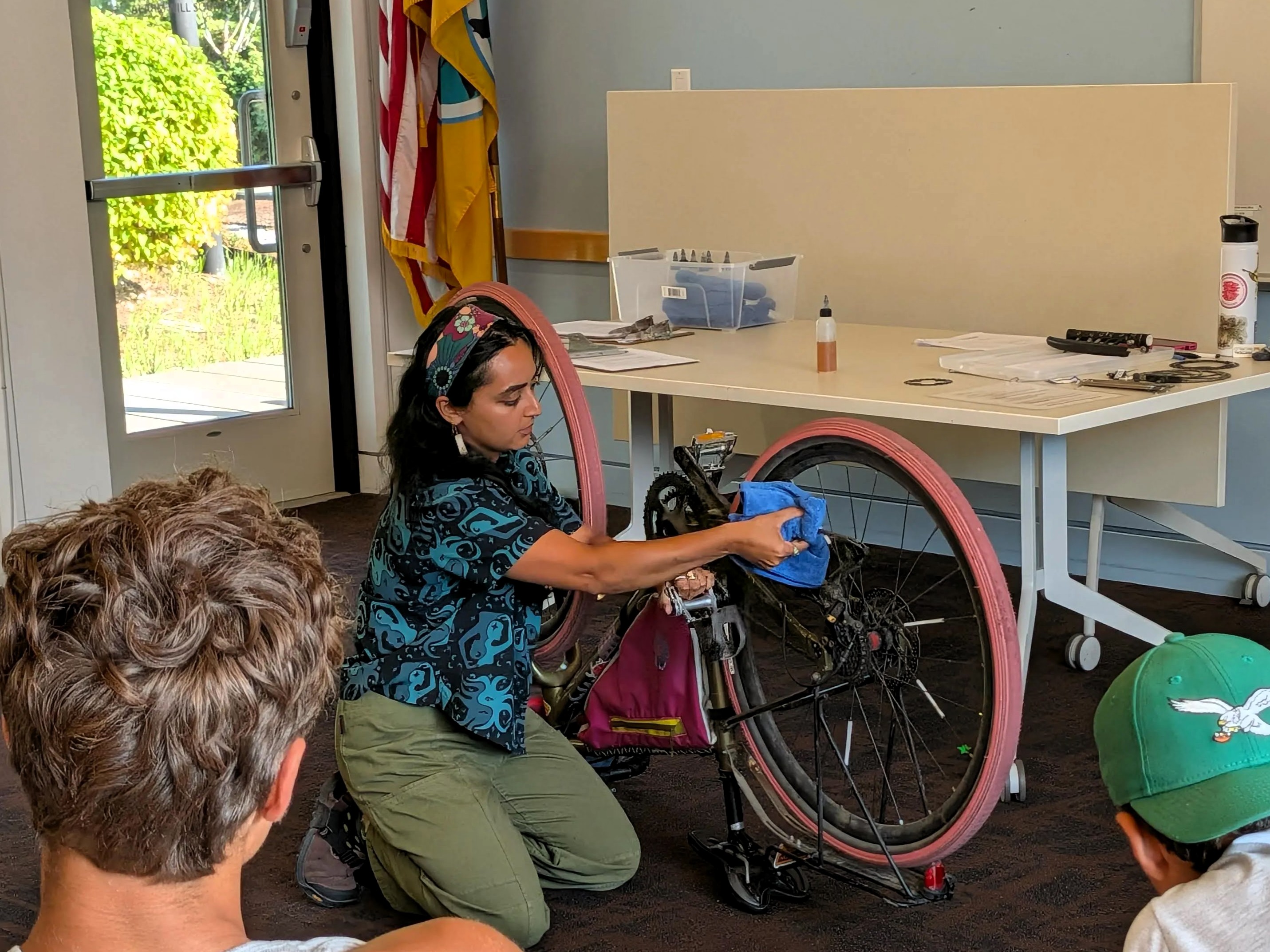 Chloe leading a bike maintenance class