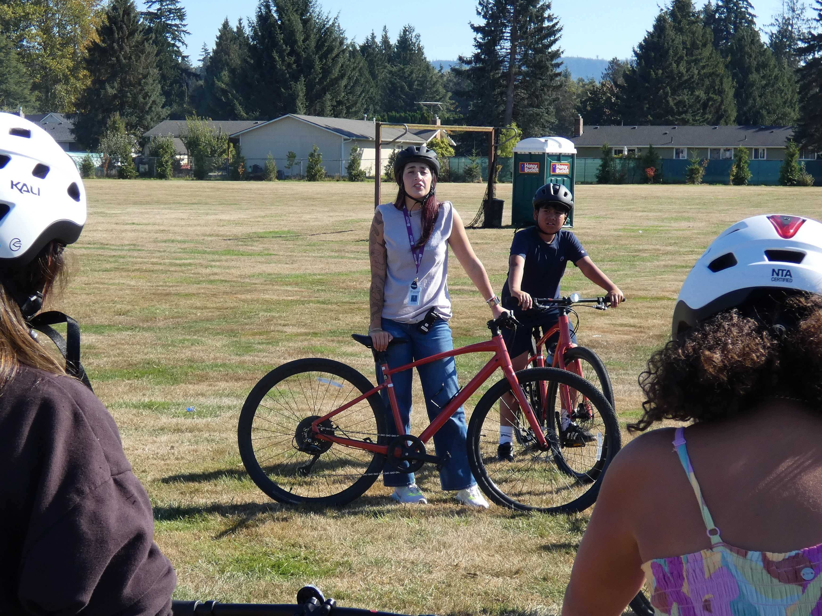 Instructor Ava Giancola-Flores discusses bike handling before the teens take off