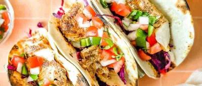Photo of three chicken tacos