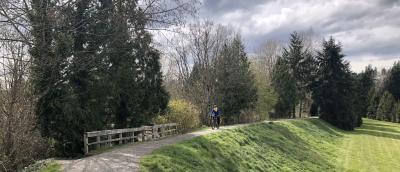 A cyclist on the North Creek Trail