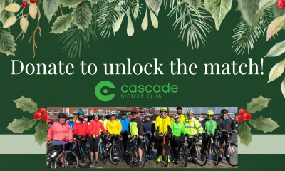 Graphic with holly berries, an image of colorful Fee Group Ride participants, and text that reads "Donate to unlock the match!" above a Cascade green logo