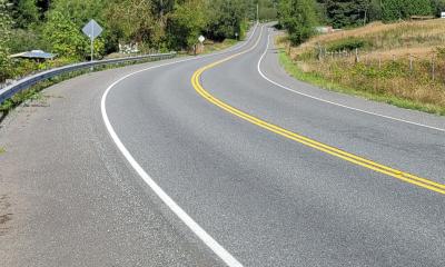 Cyclist on Open Road