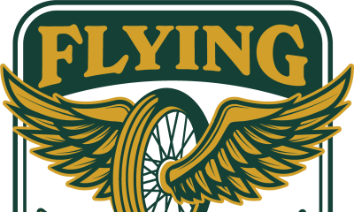 Flying Wheels logo featuring a tire with wings on either side