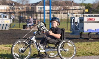 Let's Go Statewide student riding an adaptive bike