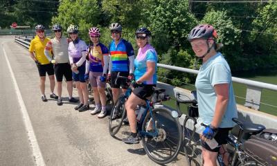Cyclists on a bridge, photo credit Jeff A.