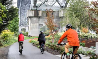People biking on the Burke-Gilman Trail through Fremont