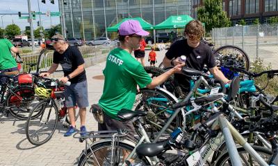 Cascade staff help guests park their bikes during the 2026 FIFA World Cup.